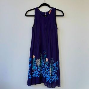 Navy blue lines dress with exquisite embellishment. Size 4. Fits like a 2.